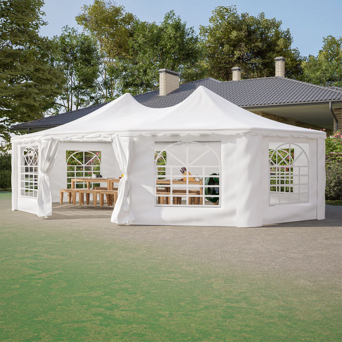 White outdoor gazebo with curtains on a grassy area with trees in the background