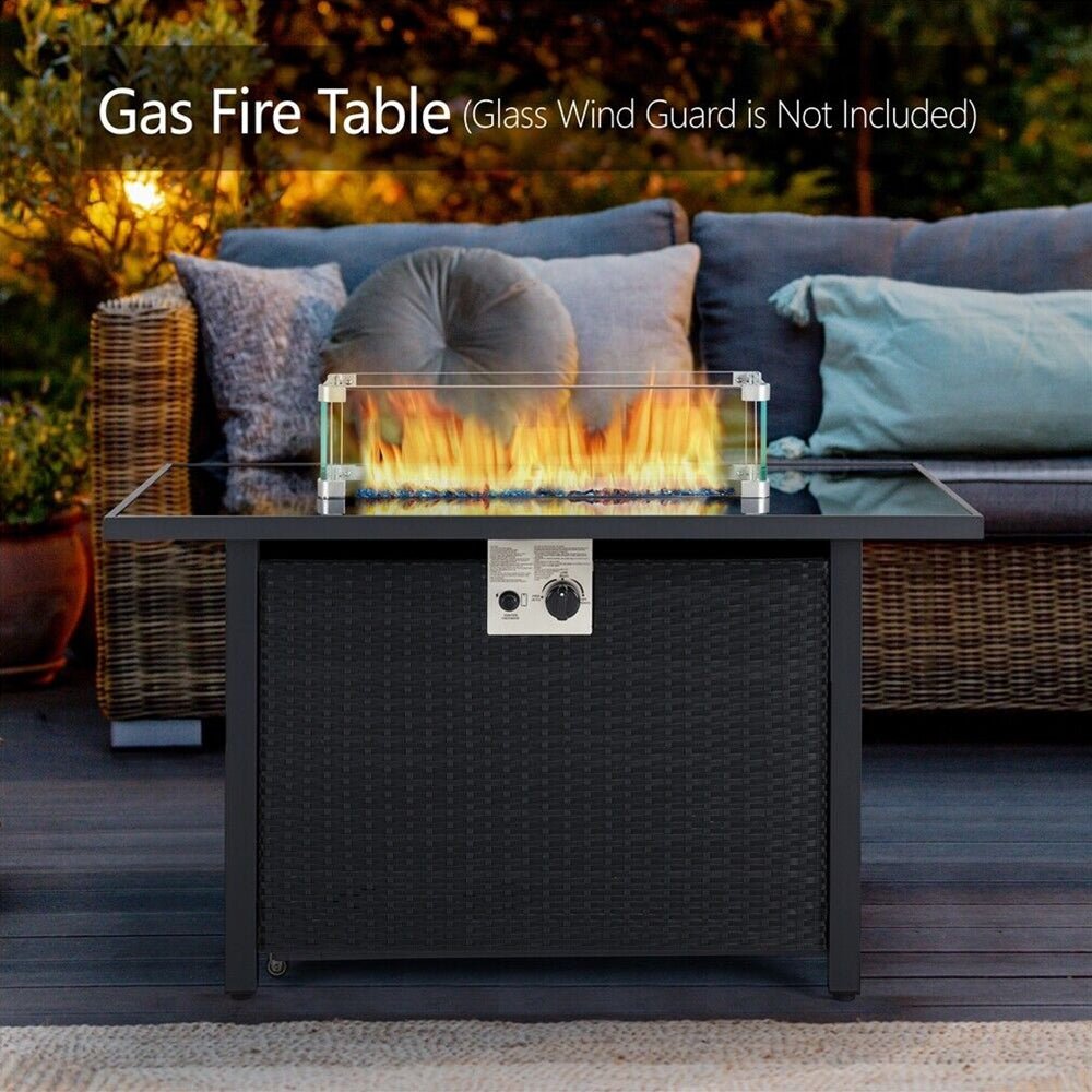Gas fire table with flames on a patio setting