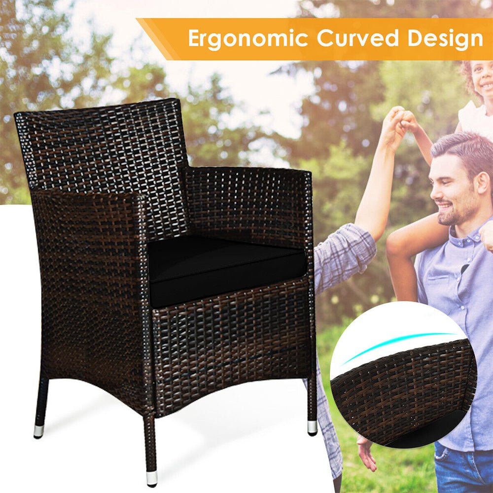 Wicker chair with ergonomic curved design, blurred background of a man and child playing.