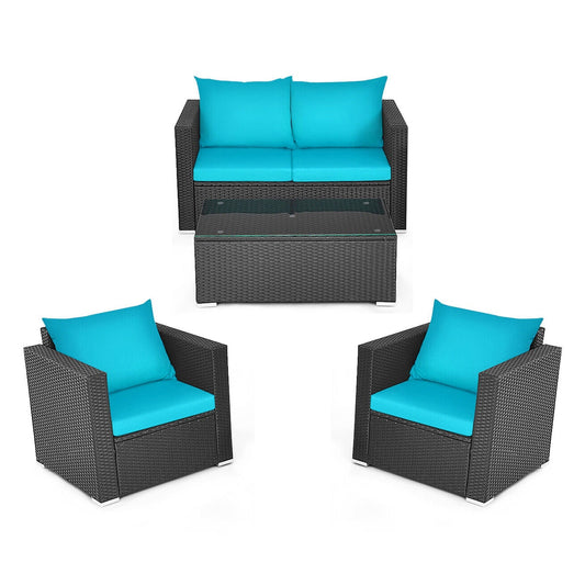 Outdoor furniture set with blue cushions on a white background