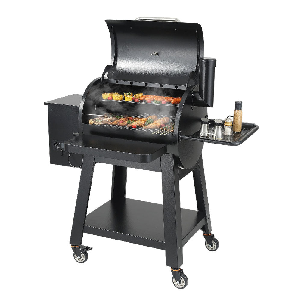Black barbecue grill with food on a white background
