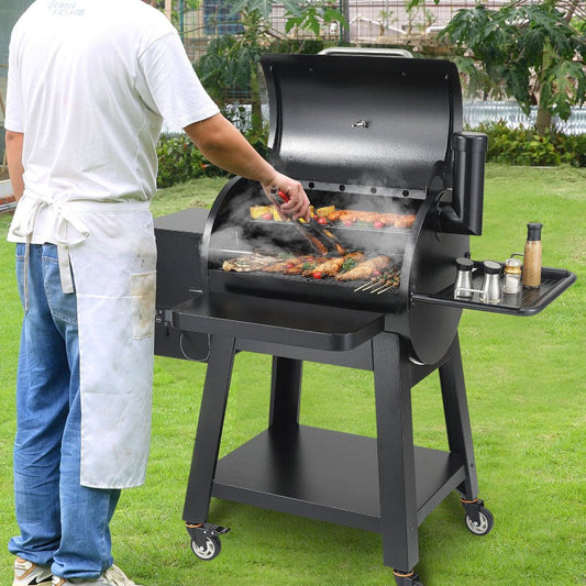 Person grilling outdoors using a large black barbecue grill on a grassy area.