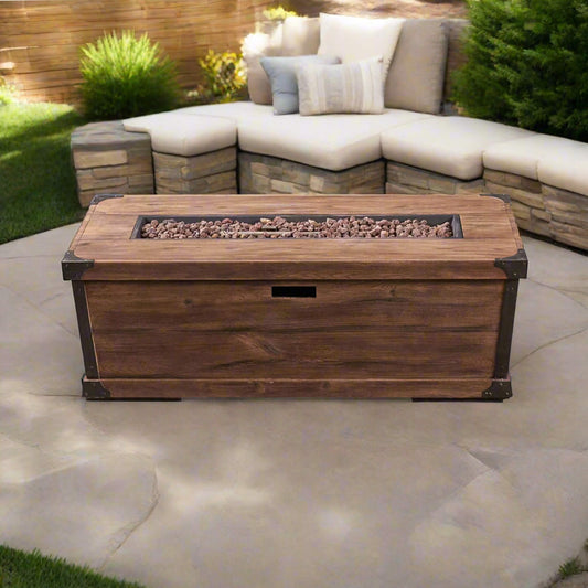 Wooden fire pit table on a patio with outdoor seating area in the background