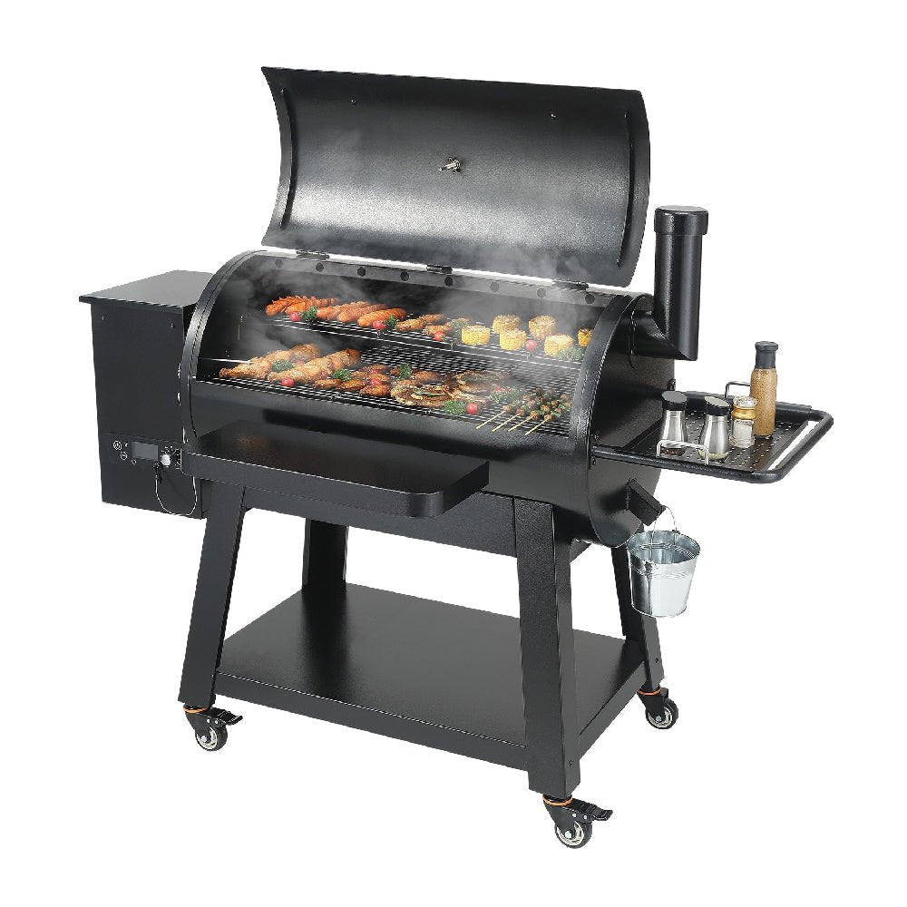 Black barbecue grill with food on a white background