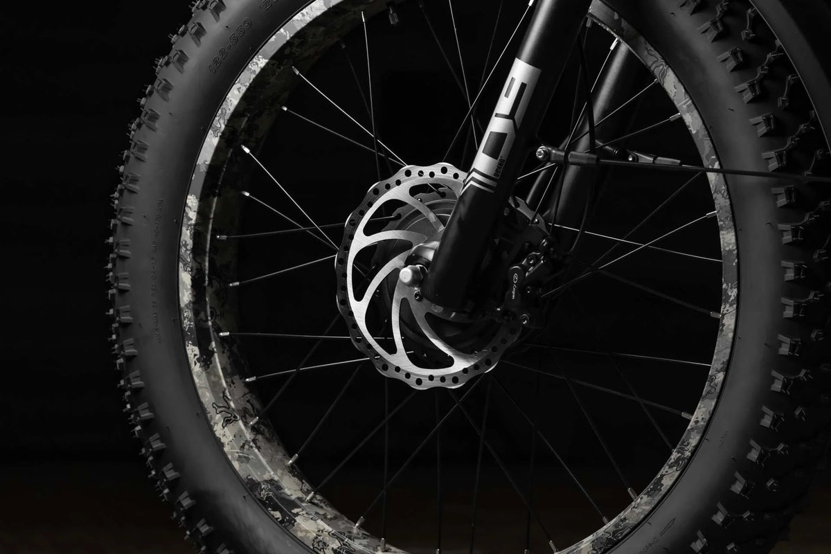 Kenda 26” x 4.8” anti-puncture tires on Rambo Megatron 4.0 gripping terrain