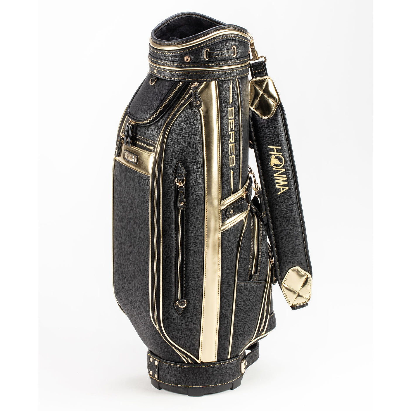 Black and gold golf bag with visible honma branding on a white background