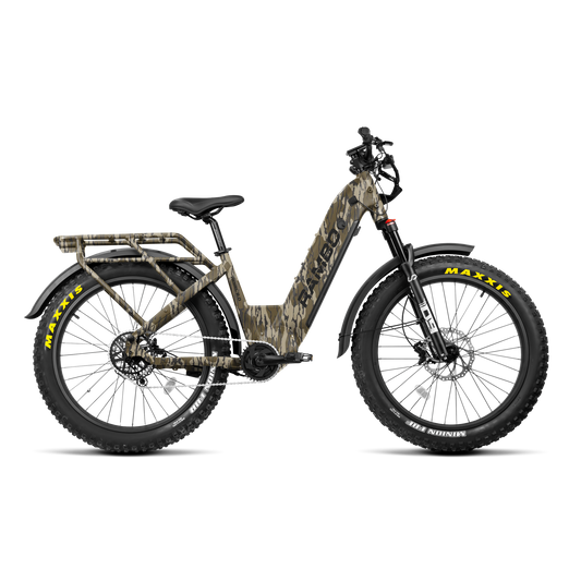 "Rambo Rebel 2.0 SS e-bike navigating forest trail in Mossy Oak camo"
