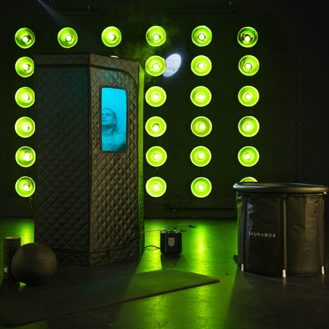 SUNABOX with green lights on a dark background