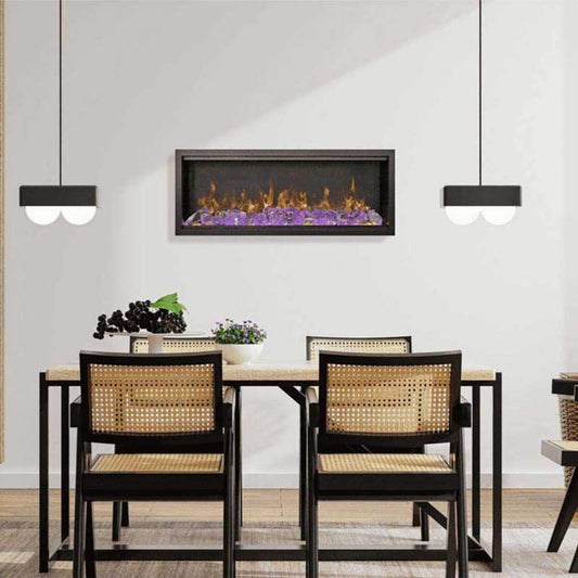 Dining area with a modern electric fireplace above a table and chairs.