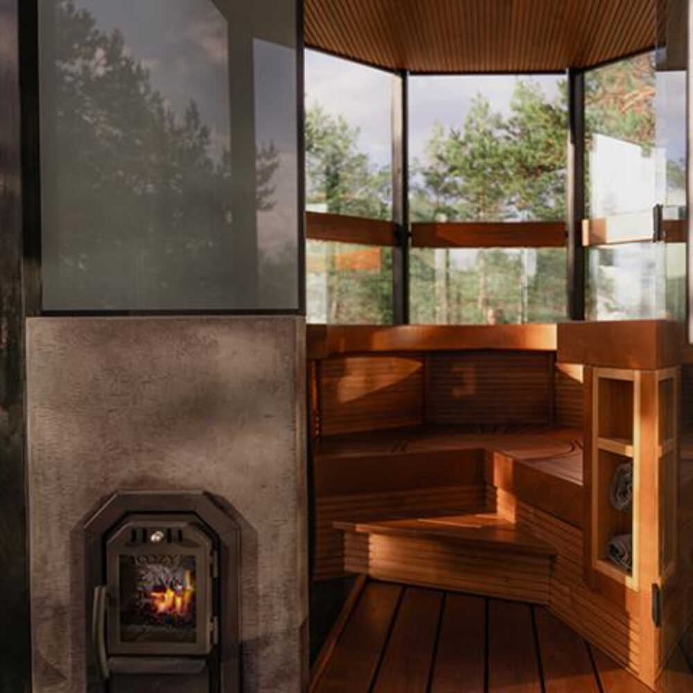 A black sauna stove with sauna stones on the exterior and a digital display, branded as 'COZY'