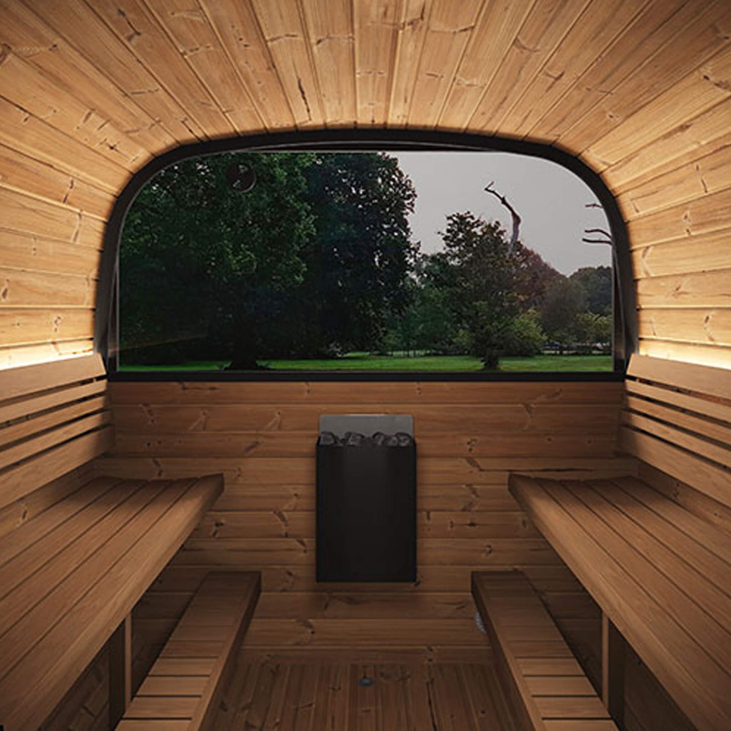 Wooden sauna interior with benches and a window overlooking trees