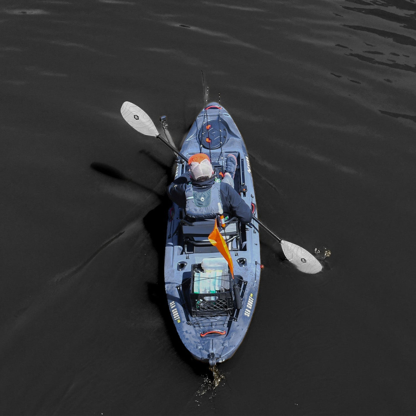 Angler steering the Vibe Sea Ghost 110 with toe-controlled rudder