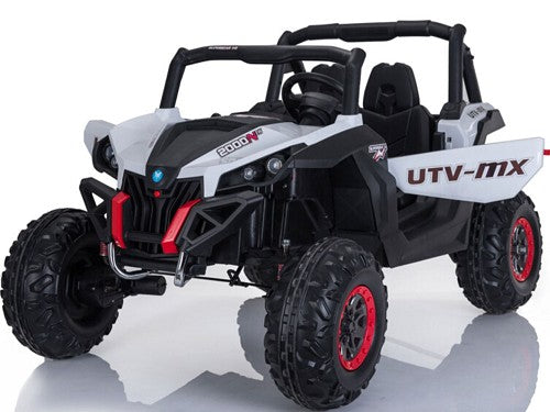 MotoTec Mini Moto UTV 4x4 12v in white driving on grass with child at the wheel