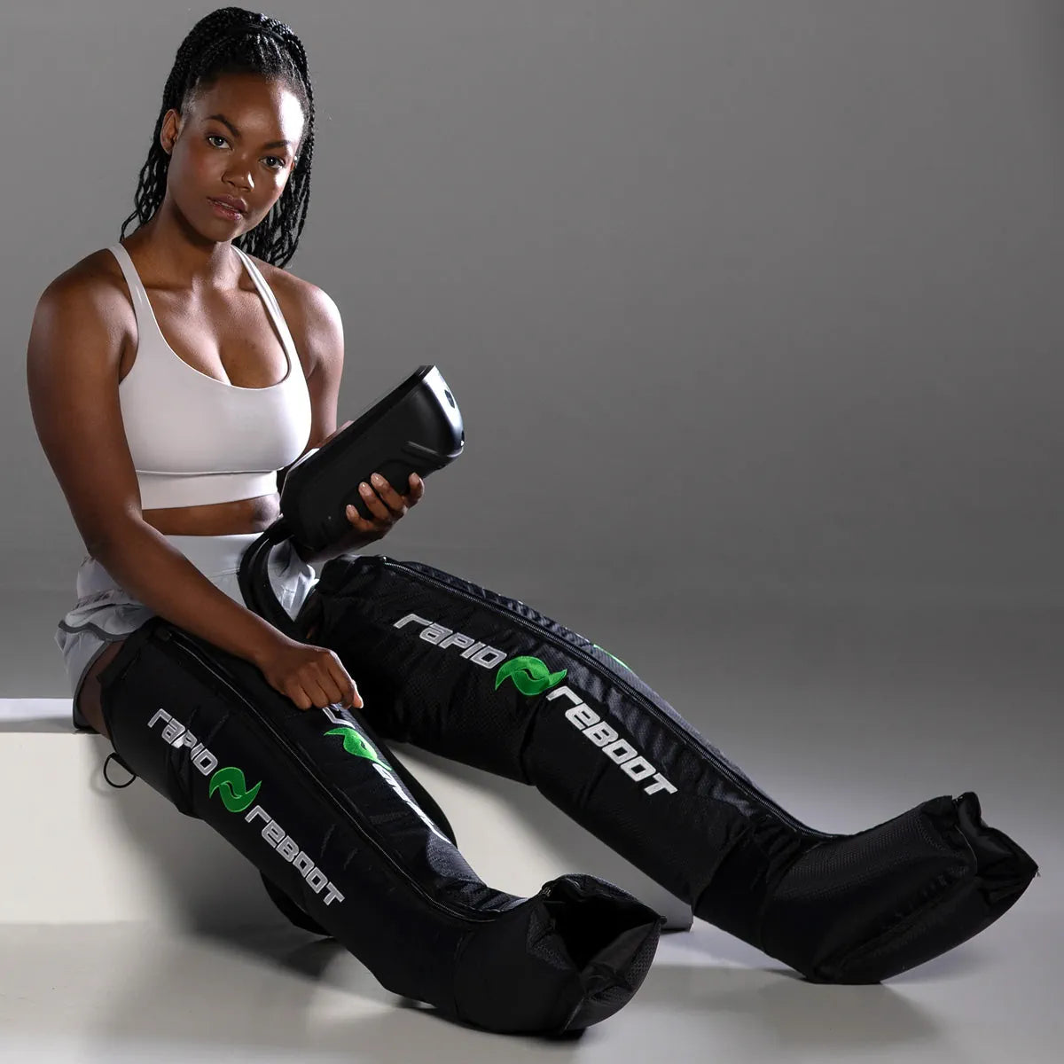 Compression devices for muscle recovery and circulation improvement with ergonomic designs