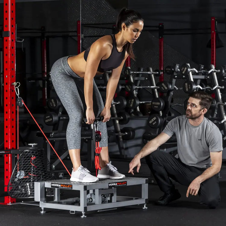 strength training using versatile cable machine