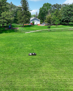 Yarbo Core mowing thick grass with the Lawn Mower Pro module