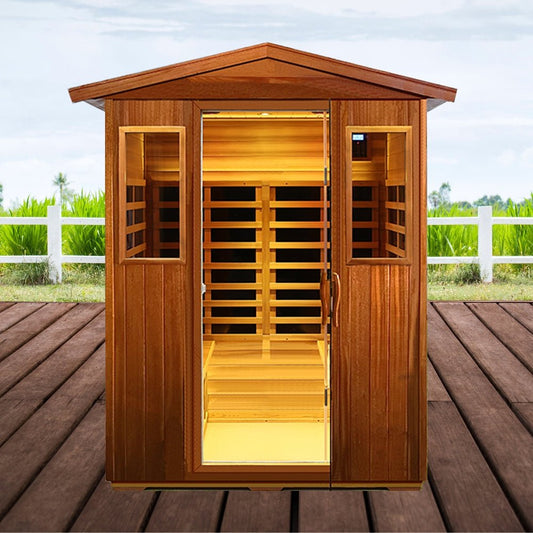 Wooden sauna with open door on a wooden deck, greenery in the background