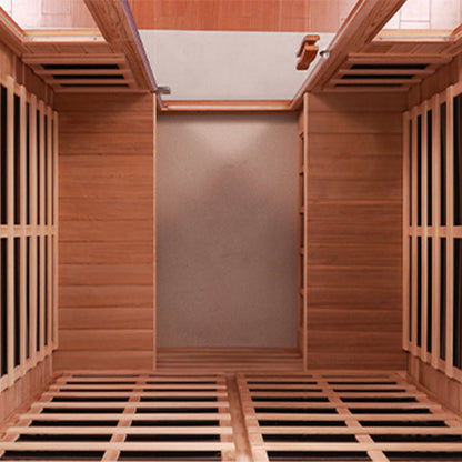 Infrared sauna with wooden interior and grid floor