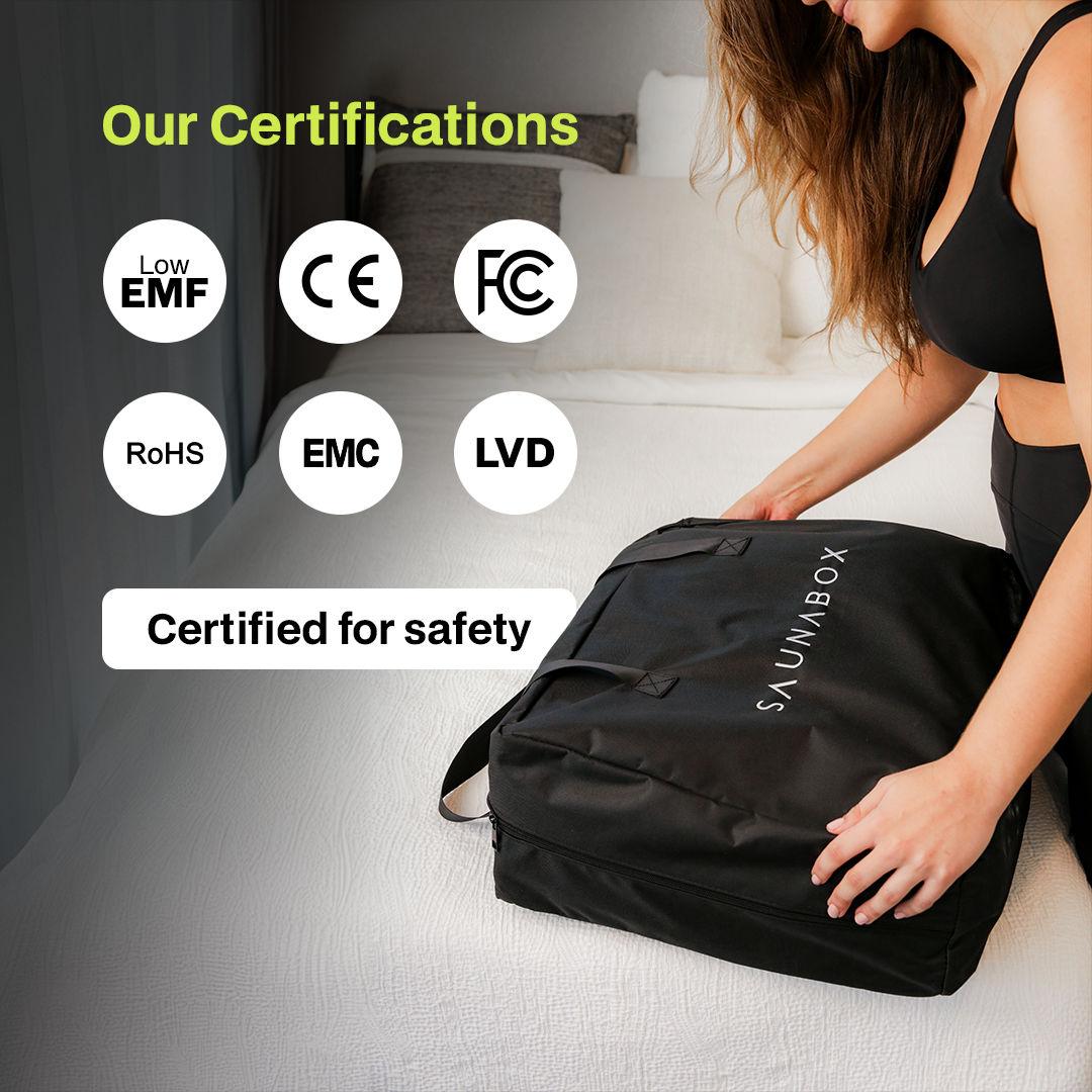 Woman opening a black Saunabox bag on a bed with certification icons displayed.