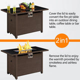 Multifunctional fire pit table with lid removed to reveal flame, and covered with a glass top.