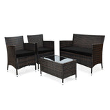 Outdoor furniture set with three chairs and a glass-top table on a white background
