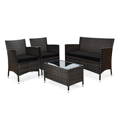 Outdoor furniture set with three chairs and a glass-top table on a white background
