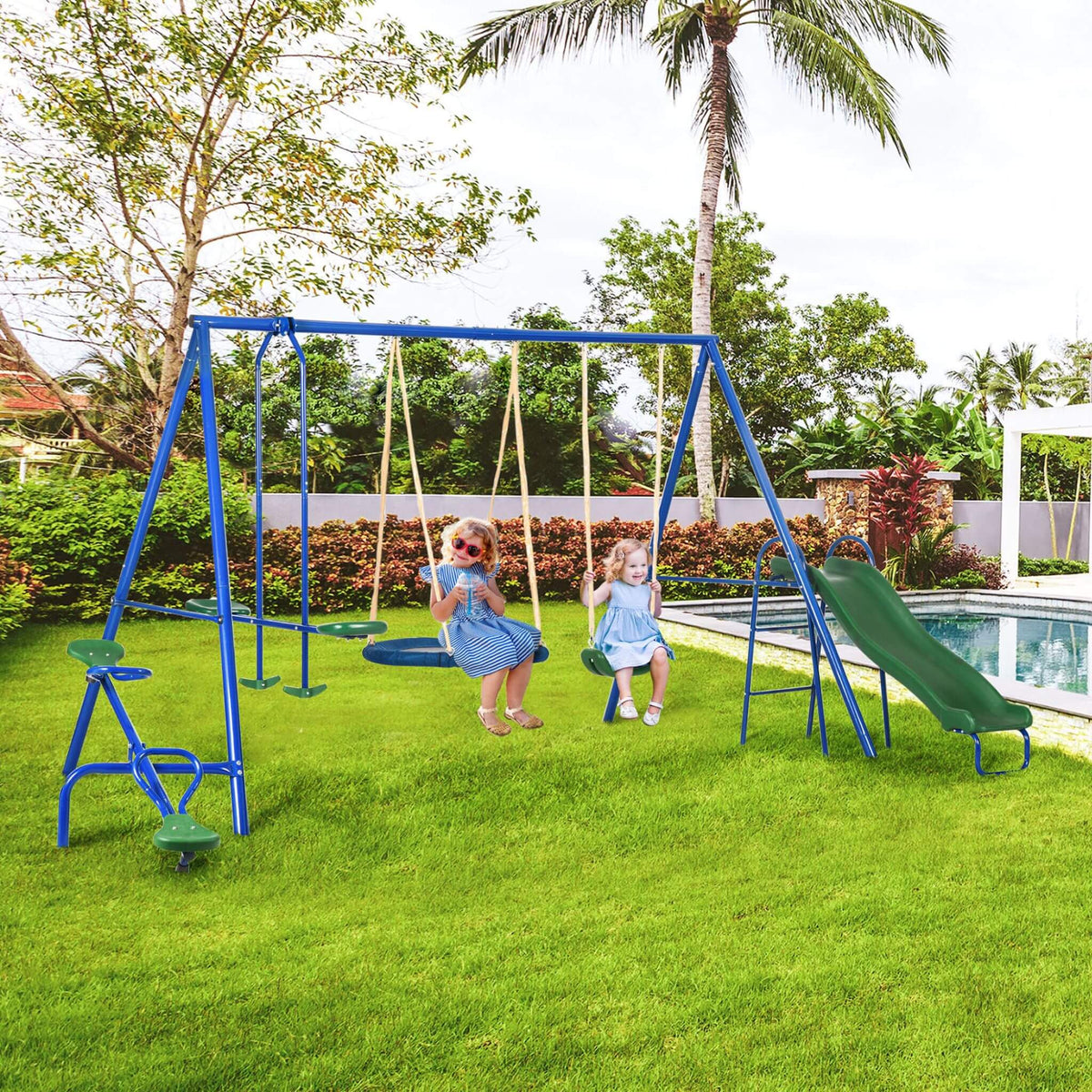 Children playing on a swing set with a pool and garden in the background