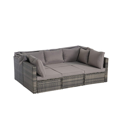 Gray outdoor sofa with cushions on a white background