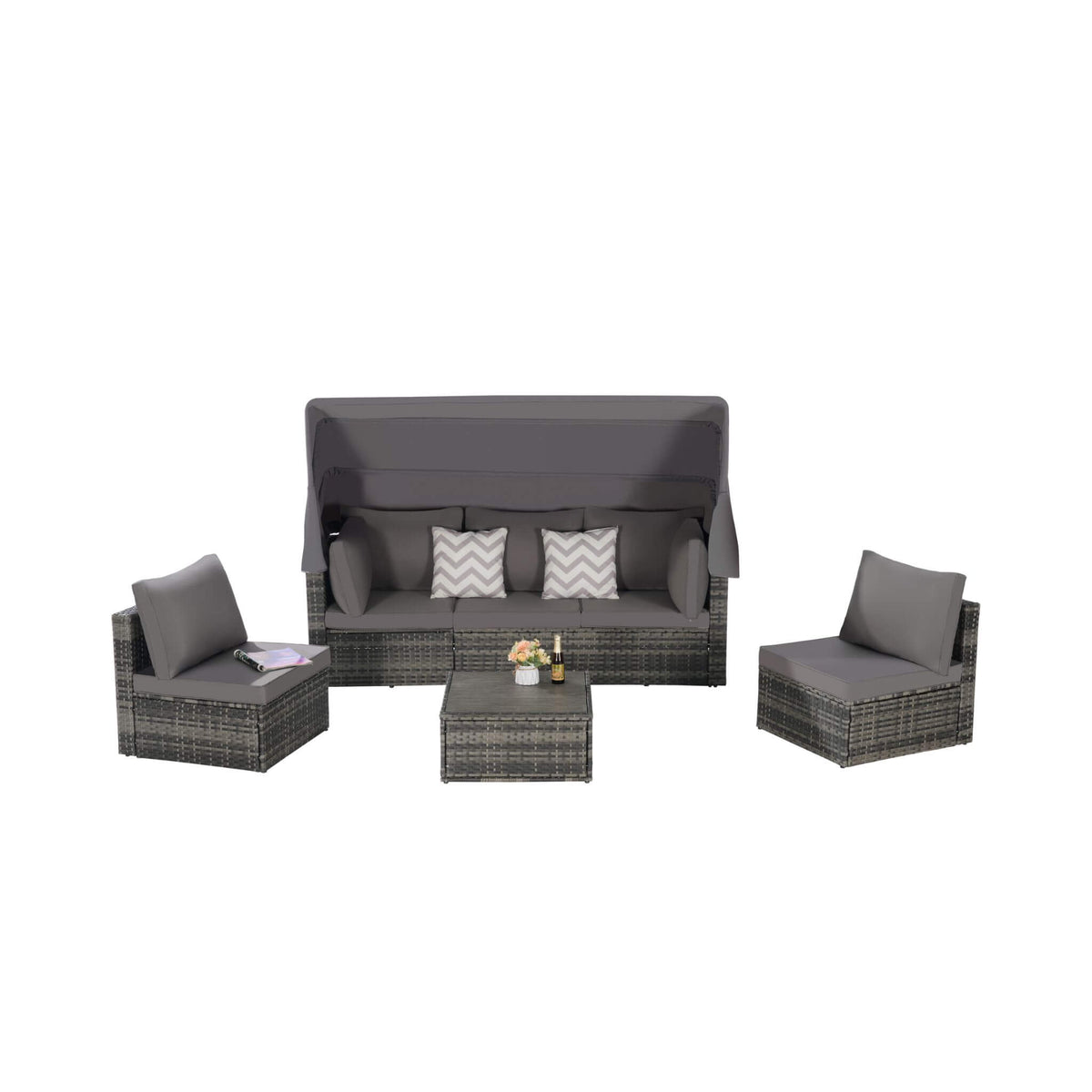Outdoor furniture set with a sofa, two chairs, and a small table on a white background