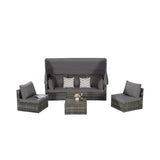 Outdoor furniture set with a sofa, two chairs, and a small table on a white background