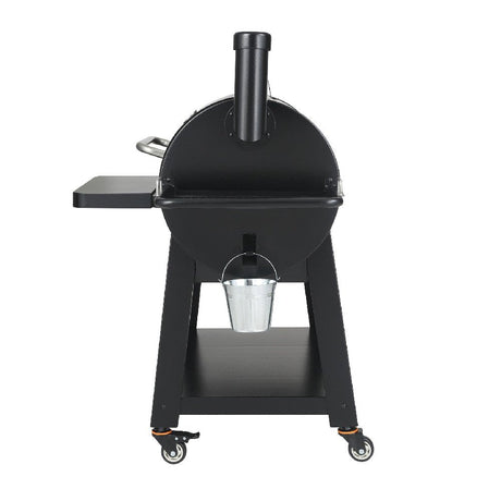 Black barbecue grill with a bucket on a white background