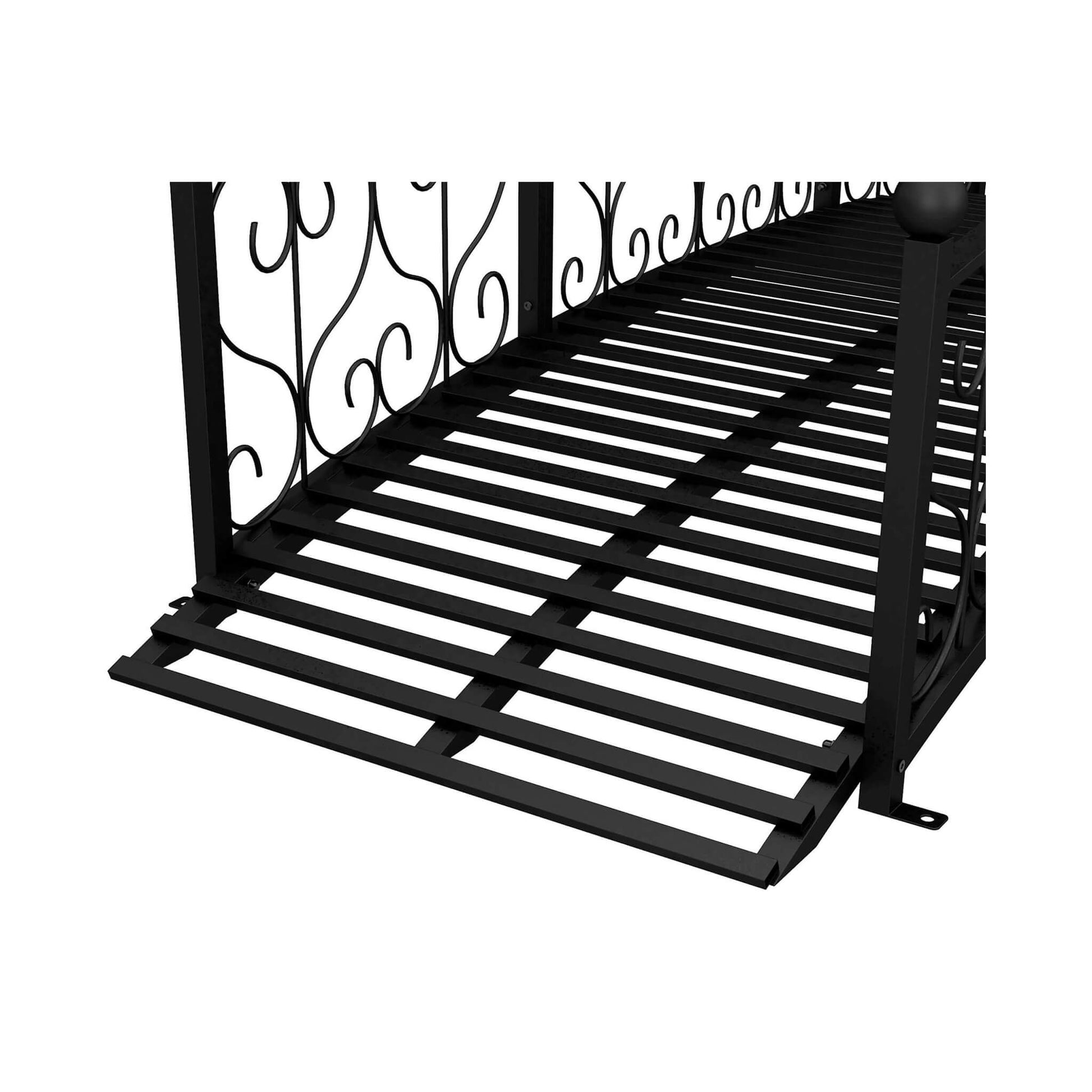 Black metal fire pit grate with decorative backrest on a white background
