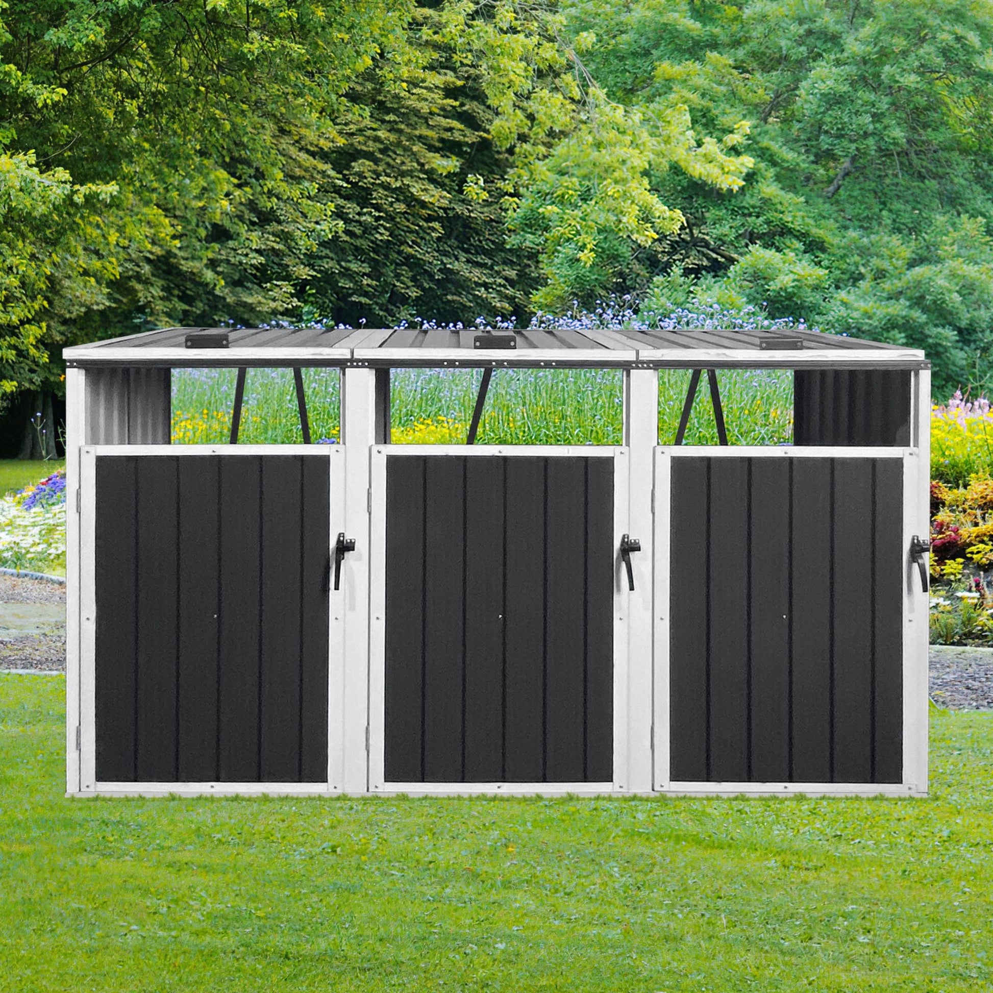 Black and white storage shed with a garden background