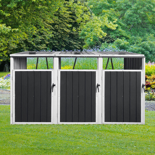 Black and white storage shed with a garden background
