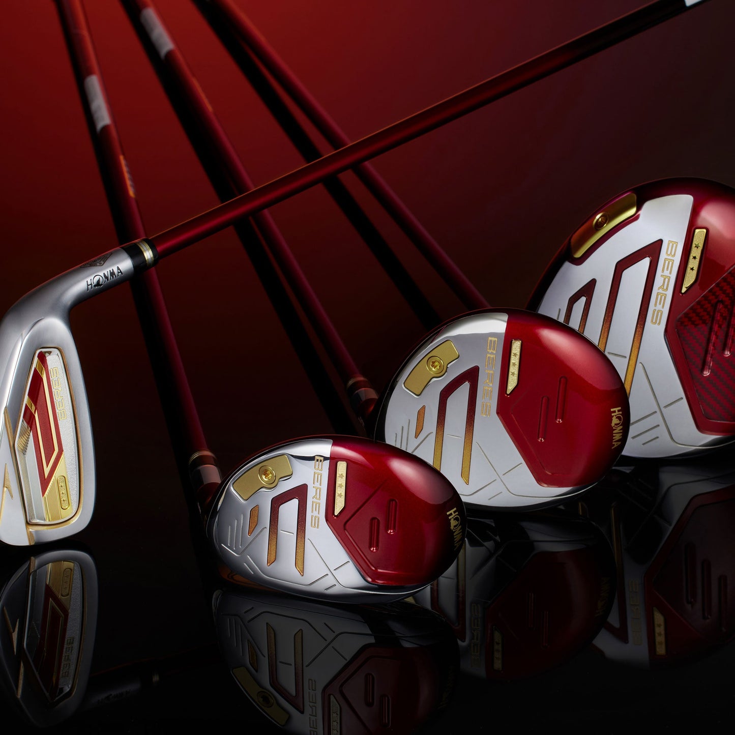 Golf clubs with red and silver design on a dark background