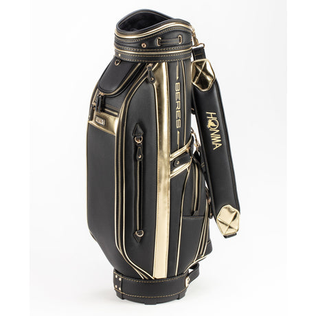 Black and gold golf bag with visible honma branding on a white background