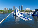 Aquaglide La Jefa TR Inflatable Aquapark – 24-Person Capacity, Climbing Wall, Slide and Jump Stations