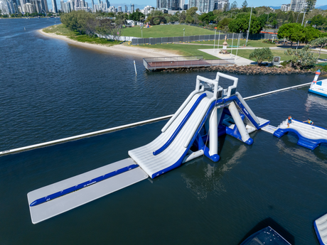 Aquaglide La Jefa TR inflatable aquapark full structure – 50 foot commercial water park with climbing wall, slide and jump stations