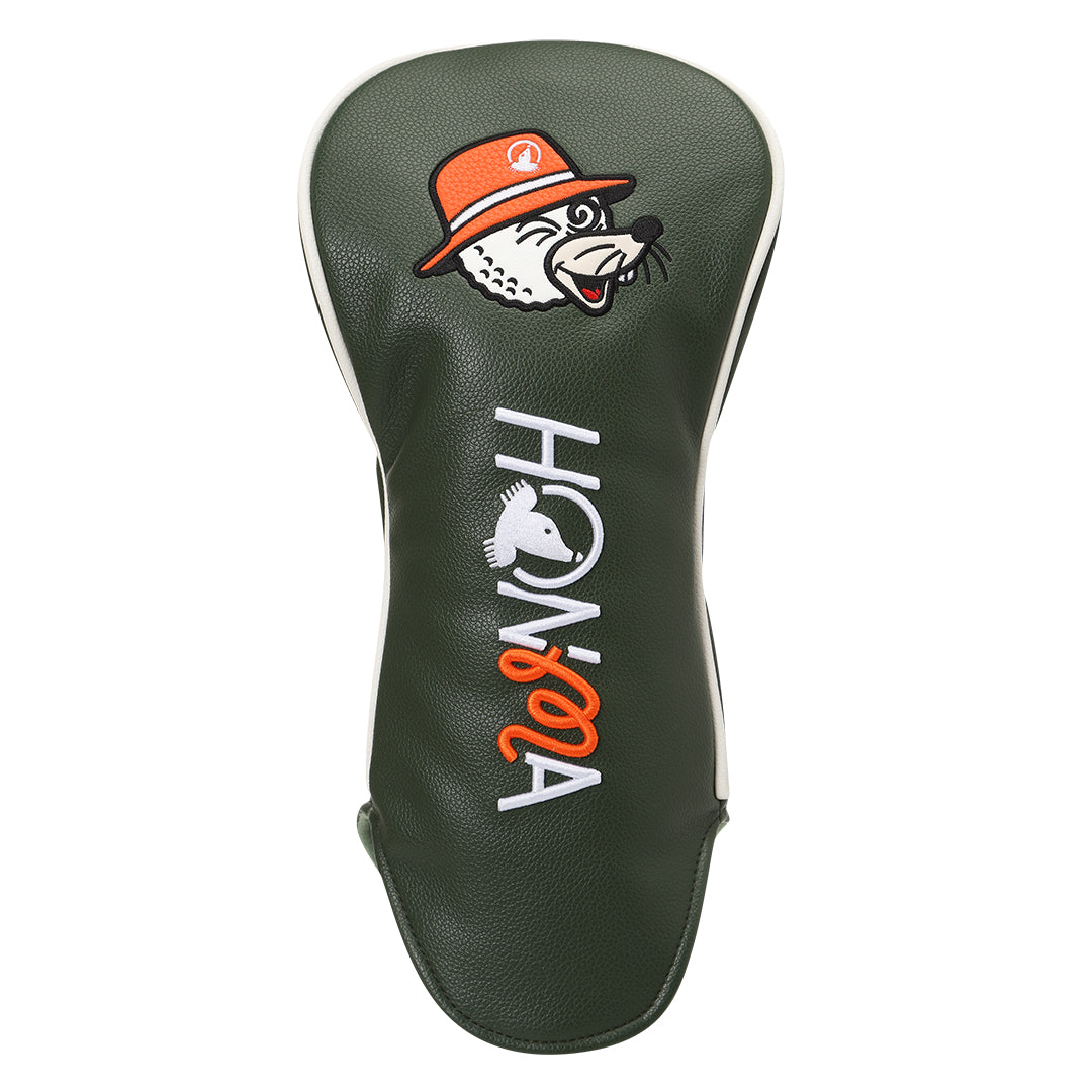Golf club head cover with a cartoon character and 'Honma' branding on a white background