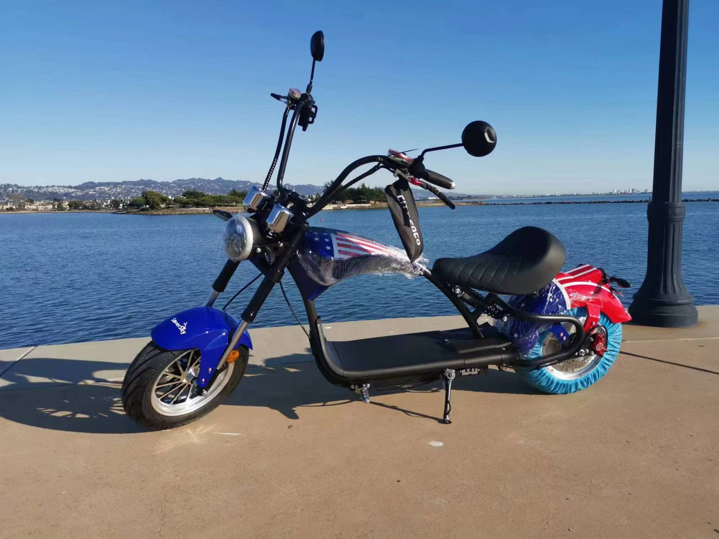 SoverSky M3 60V Electric Chopper Scooter cruising city street