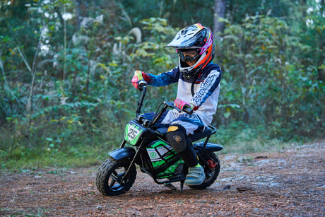 Child riding the MotoTec 24v 250w Electric Mini Bike Black safely outdoors