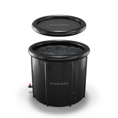 Black inflatable sauna with lid on a white background