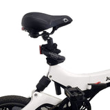 Close-up of a bicycle seat and lock on a white background