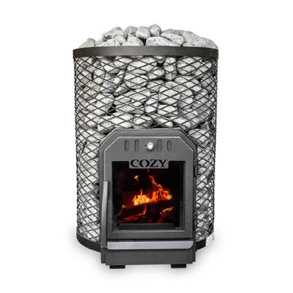 A CozyHeat O floor mount wood-burning sauna stove with sauna stones on top and a visible fire inside the stove.