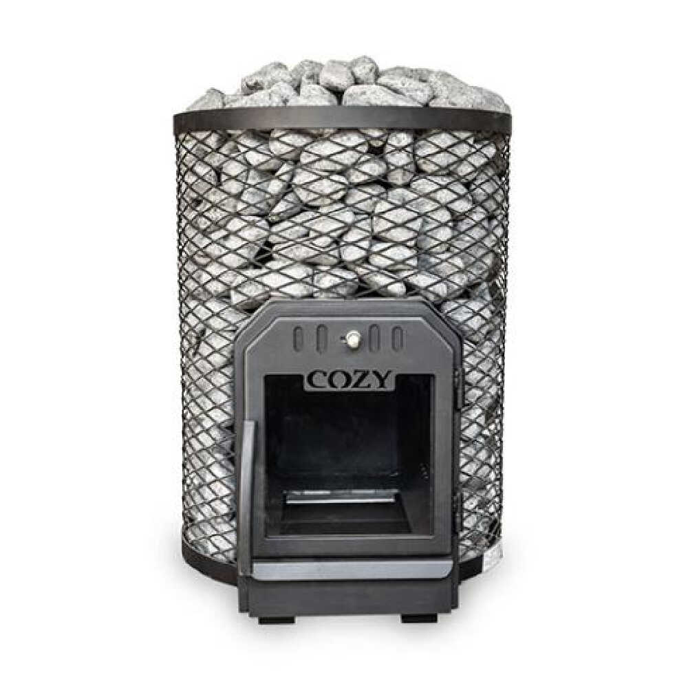 A CozyHeat O floor mount wood-burning sauna stove with sauna stones on top and a visible fire inside the stove.
