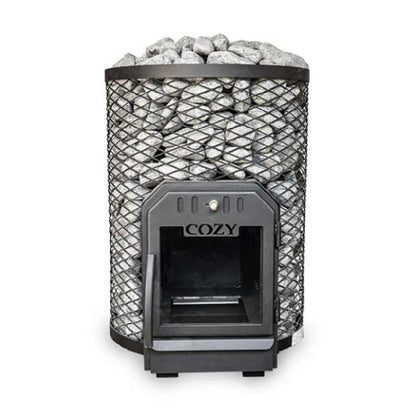 A CozyHeat O floor mount wood-burning sauna stove with sauna stones on top and a visible fire inside the stove.