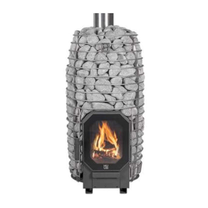 A gray wood-burning sauna stove with sauna stones and a visible fire through the front opening.