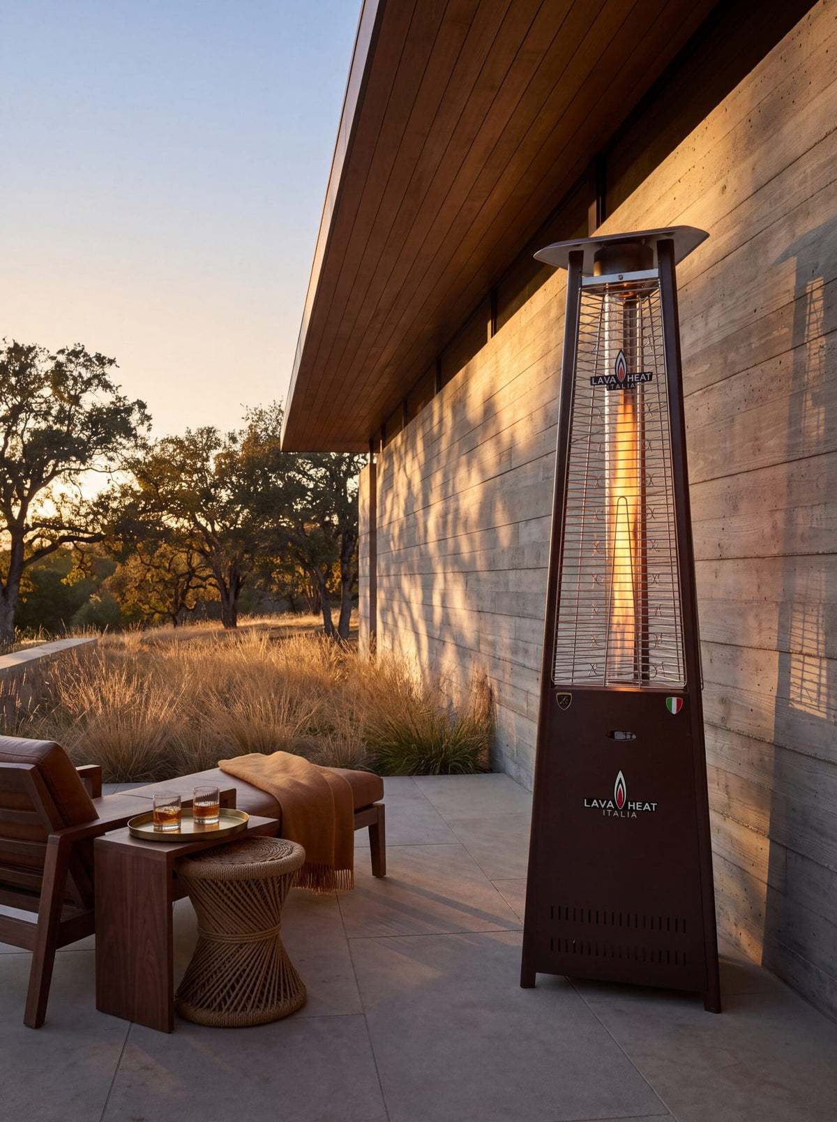 Lava Heat Italia 2G Flame Tower patio heater in an outdoor setting