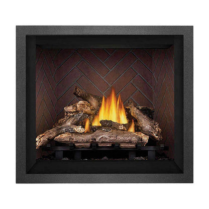 Fireplace with logs and flames against a brick wall