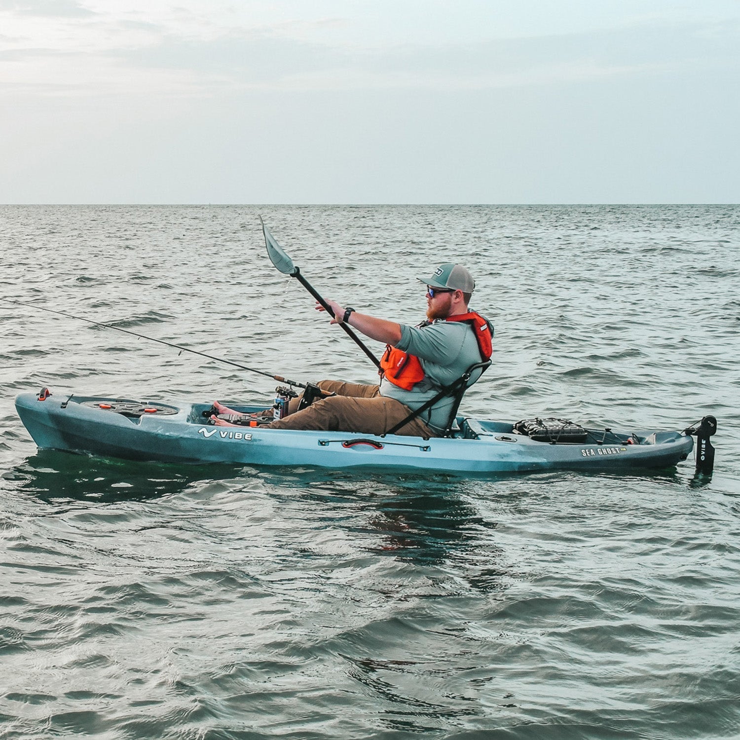 Vibe Sea Ghost 110 Fishing Kayak gliding on calm river waters